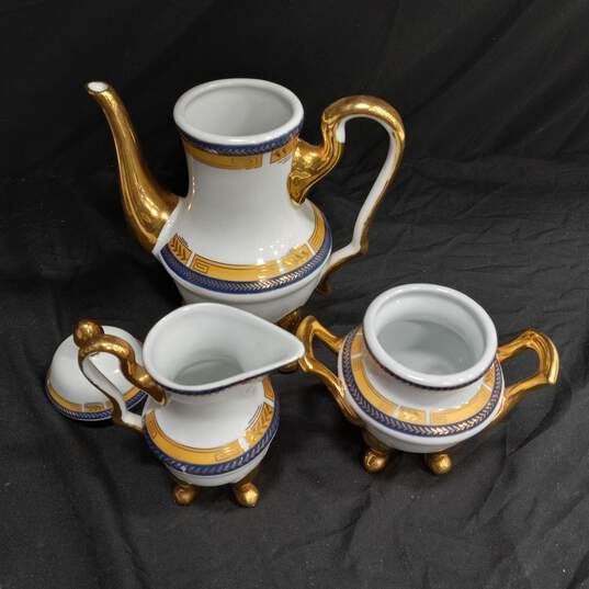 Yau Shing Fine China Teapot, Cream & Sugar, 2 Cups & 6 Saucers image number 3