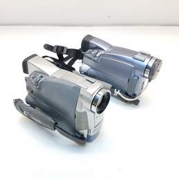 Set of 2 Canon ZR MiniDV Camcorders FOR PARTS OR REPAIR