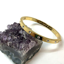 Designer Kate Spade Gold-Tone Crystal Cut Stone Hinged Bangle Bracelet