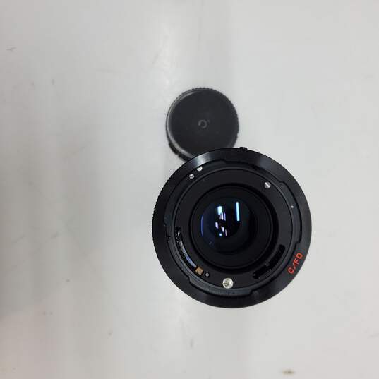 UNTESTED Sliver/Black Canon AE-1 Film Camera Bundle with 3 lenses, Flash & Bag image number 8
