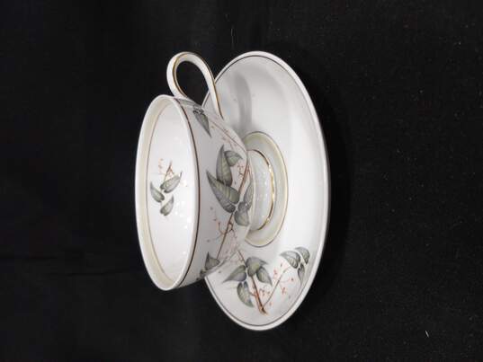 China Set of 4 White Teacups And 5 Saucers w/ Floral Pattern image number 4