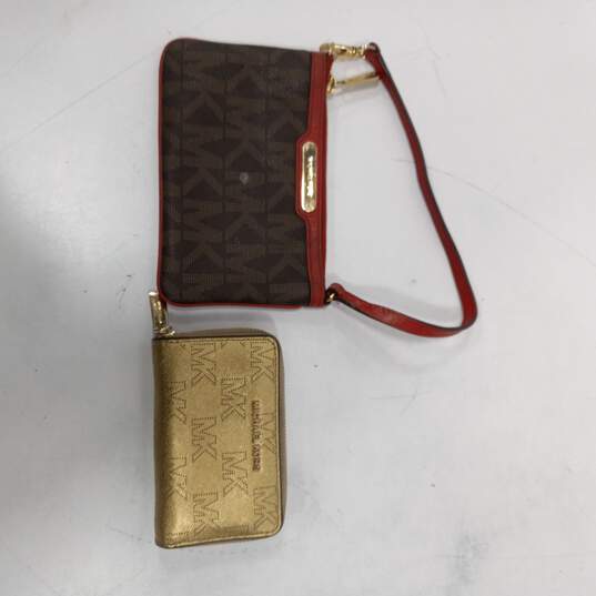 Pair Of Assorted Michael Kors Women's Leather Wallets image number 1