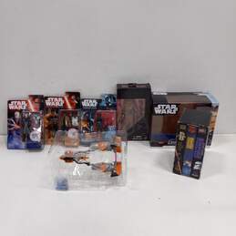 Bundle of Assorted Star Wars Action Figures & VHS Tapes