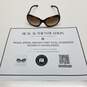 AUTHENTICATED Prada Brown Tort Oval Oversized Sunglasses image number 1