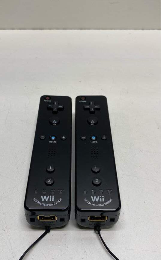 Set Of 2 Nintendo Wii Motion Plus Remotes- Black image number 1