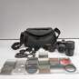 Minolta Maxxum 3000i Film Camera & Accessories in Bag image number 1