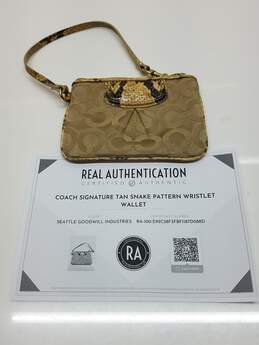 AUTHENTICATED Coach Signature Tan Snake Pattern Wristlet Wallet
