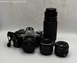 Canon AE-1 Program Film Camera & 3 Camera Lens Attachments
