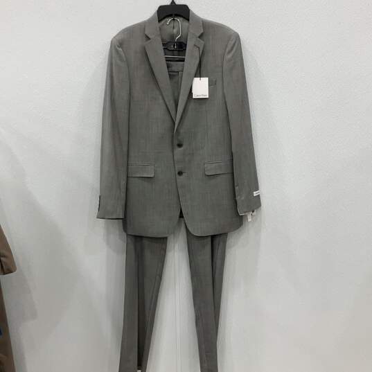 Calvin Klein NWT Mens Gray Long Sleeve Blazer & Pants 2 Piece Suit Set Size 42L image number 1