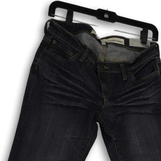 NWT Womens Blue Medium Wash Denim Pockets Everyday Skinny Jeans Size 6S image number 3
