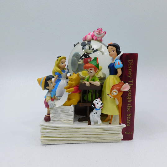 Disney Through The Years Vol. 1 Musical Snow Globe Bookend image number 1