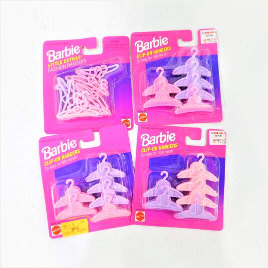 Lot Of Sealed Barbie Doll Clothing Hangers image number 1