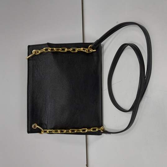 Buy the Black Shoulder Bag with Gold Tone Chain Accent