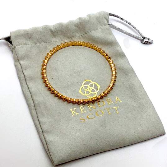 Designer Kendra Scott Gold-Tone Practical Spiked Design Bangle Bracelet image number 1