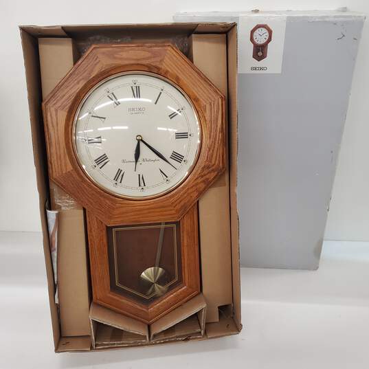 Seiko Schoolhouse Pendulum Wall Clock Traditional Brown Oak image number 1
