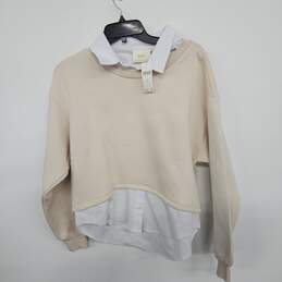 Creme Sweater Over White Collared Long Sleeve Shirt