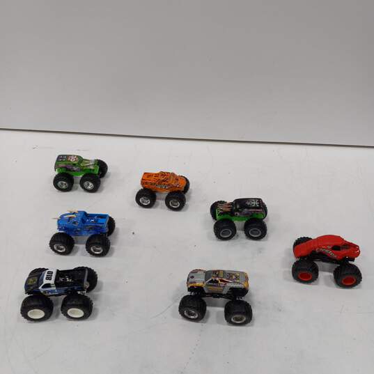 Bundle of Assorted Monster Jam Toy Cars with Travel Case image number 4