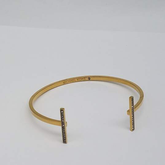 Michael Kors Gold Tone Crystal 5 1/2 Inch Cuff Bracelet 6.5g image number 1