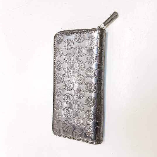 Buy the Michael Kors Women's Silver Zip Around Wallet | GoodwillFinds