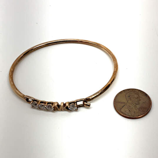 Designer Michael Kors Rose Gold Crystal Pave Hinge Fashion Bangle Bracelet image number 2