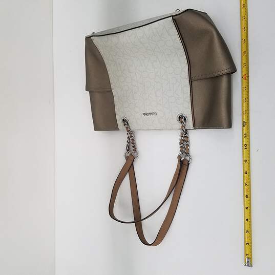 Buy the Calvin Klein Brown & White Leather Tote Bag