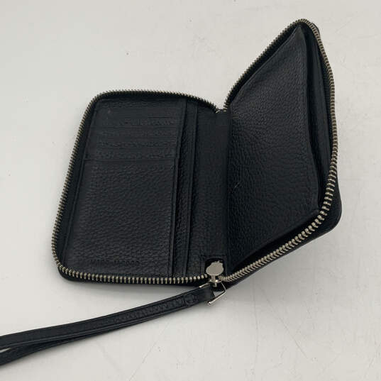 Buy the Womens Black Leather Inner Pocket Continental Zip-Around Wallet