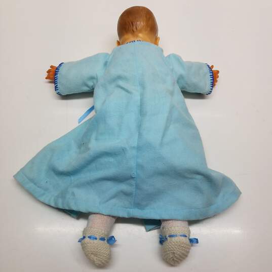 Vintage unmarked newborn baby doll in blue dress and diaper image number 4