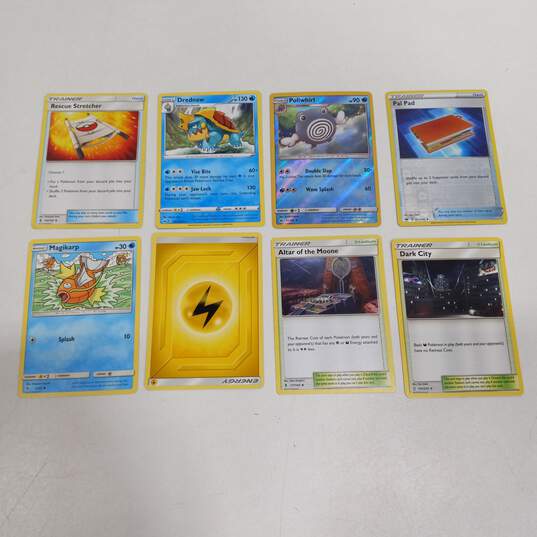 Lot of Assorted Pokemon Trading Cards In Tin image number 4