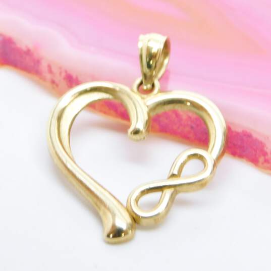 10K Yellow Gold Infinity Sign Heart & Filigree Dolphin Pendants 1.4g image number 3