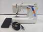 Janome Mini Sewing Machine Model HF107 with Foot Pedal image number 1