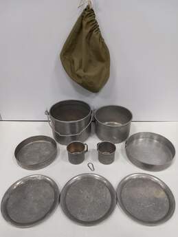 ALUMINUM CAMPING COOKWARE: INCLUDES 2 POTS, 2 CUPS, 2 PANS, 3 PLATES, AND STORAGE BAG