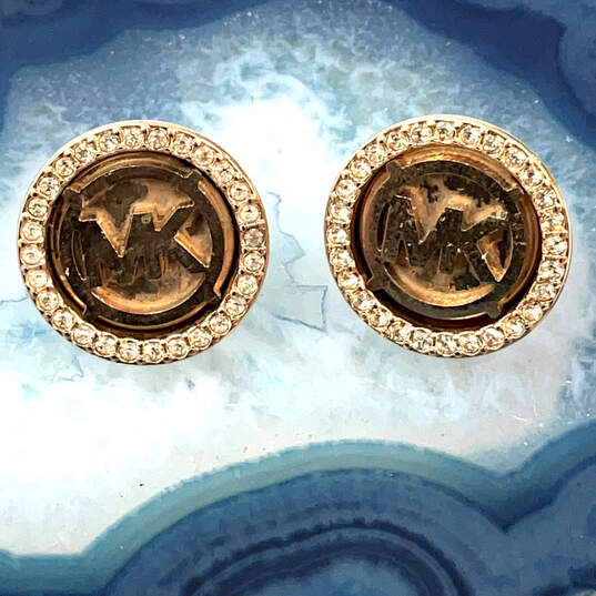 Designer Michael Kors Gold-Tone Clear Rhinestone Monogram Stud Earrings image number 1