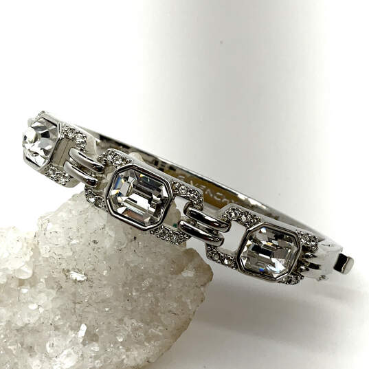 Designer Givenchy Silver-Tone Clear Crystal Stone Hinged Bangle Bracelet image number 1