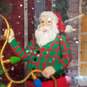 Raz Imports Santa Decorating Tree Light Up TV Snow Globe image number 3