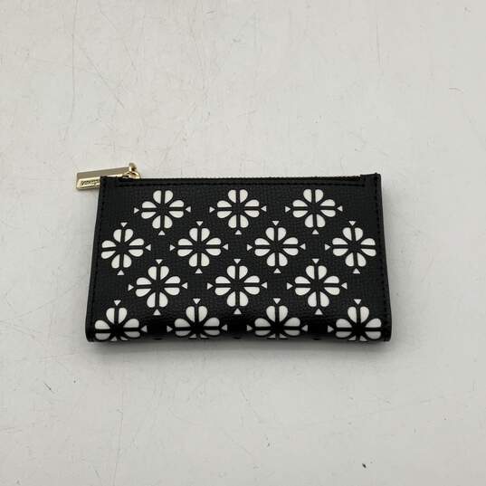 Kate Spade Womens Sylvia Black White Floral Perforated Slim Bifold Wallet image number 1