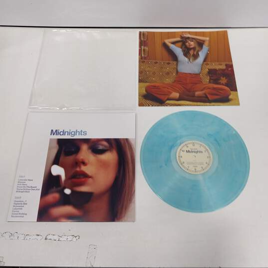 Pair of Taylor Swift Moonstones Midnight Blue Edition Vinyl Records image number 3