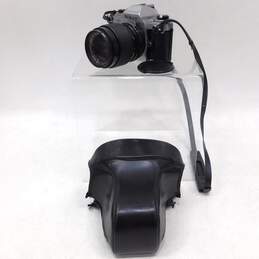 VNTG Nikon Brand FG Model 35mm Film Camera w/ Attached Case and Strap