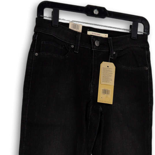 NWT Womens Black Denim Dark Wash Mid-Rise Skinny Leg Ankle Jeans Size 4 image number 4