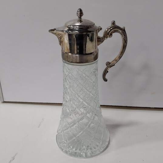 Vintage Cut Glass Decanter Pitcher With Silver Top Center Ice Chamber image number 1