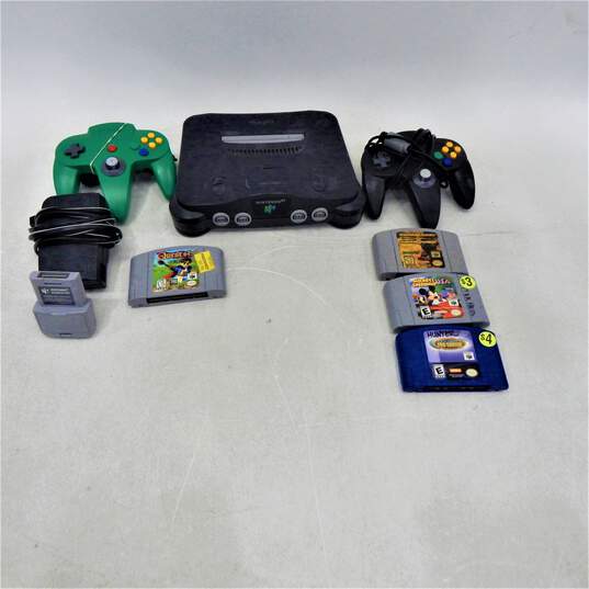 Nintendo 64 W/ Four Games Quest 64 image number 1