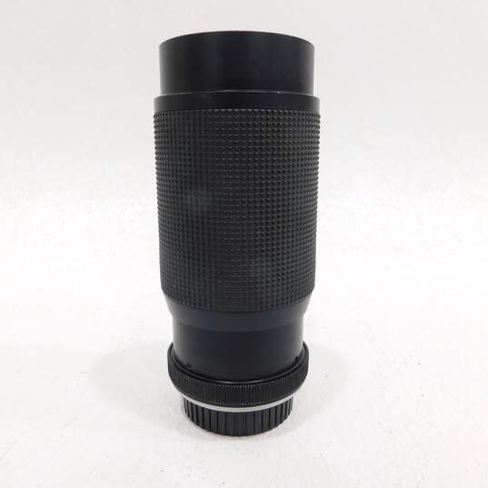 Minolta XG-9 35mm SLR Film Camera w/ 2 Lenses, Flash & Neck Strap image number 15