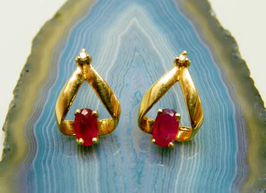 14K Yellow Gold Oval Ruby Round Diamond Accent Ribbon Earrings 1.6g image number 1