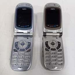Pair of Vintage Qwest Flip Phones alternative image
