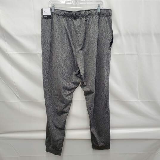 NWT Nike's MN's Heathered Gray Yoga Dri- Fit Pants Size XXL image number 2