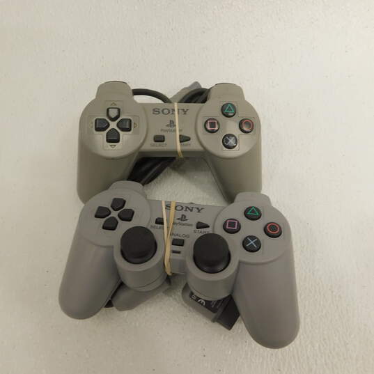 Sony PlayStation w/4 Games and 2 controllers image number 2