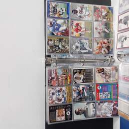 Bundle of Three Binders of Assorted Sports Trading Cards alternative image