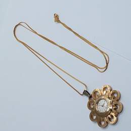 Caravelle Gold Tone Flower On Chain Vintage Automatic Manual Wind Pendant Watch alternative image