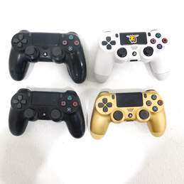 4 Used Sony Dualshock 4 Controllers