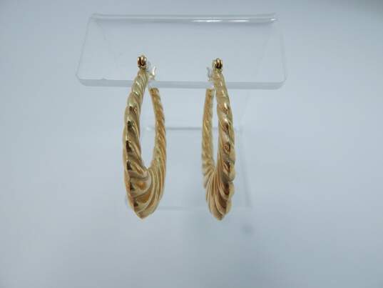 14K Yellow Gold Ridged Oblong Hoop Earrings 4.7g image number 1
