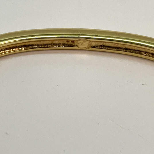 Designer Swarovski Gold-Tone White Rhinestone Hinged Bangle Bracelet image number 4